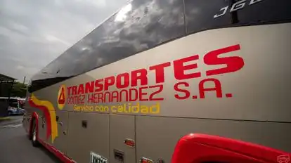 Gomez Hernandez Bus-Side Image
