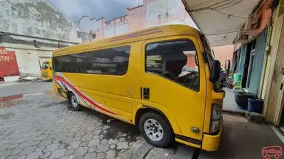 Ladju Transport Bus-Side Image