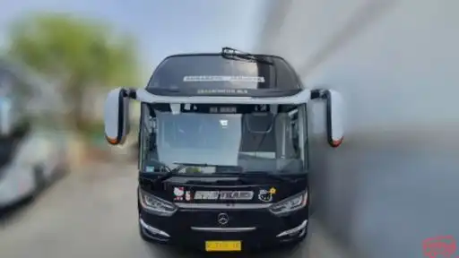 KYM Trans Bus-Front Image