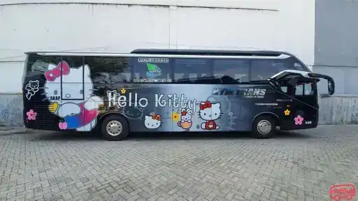 KYM Trans Bus-Front Image