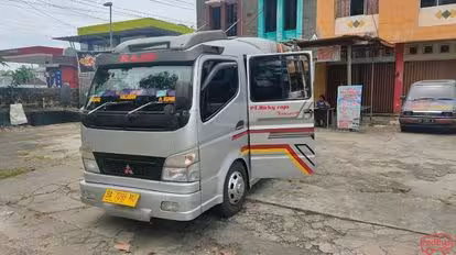Ricky Rajo Transport Bus-Front Image