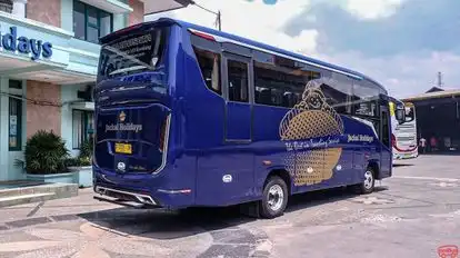 Jackal Holidays Bus-Side Image