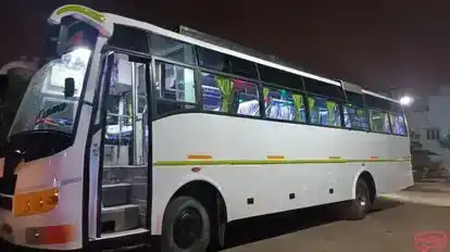 India  tours and travels Bus-Side Image