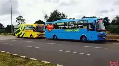 Nakoda    Travels  Bus-Side Image