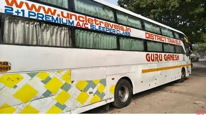Uncle   Travels Bus-Side Image