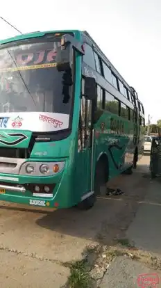 Pooja      Travels Bus-Side Image
