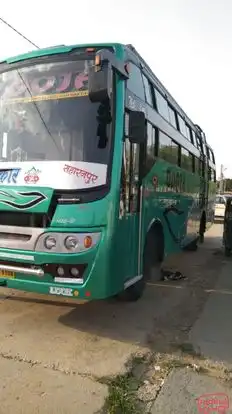 Pooja      Travels Bus-Side Image