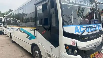 Triguna Travels Bus-Side Image