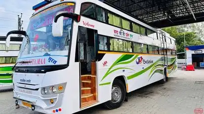 J J  Travels Bus-Side Image