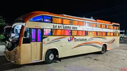 J J  Travels Bus-Side Image
