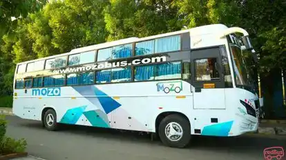 Mozo travels Bus-Side Image