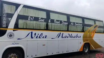 Nilamadhab Travels Bus-Side Image