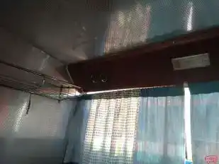 MS Apple Tours and Travels Bus-Side Image