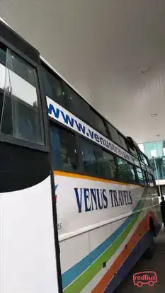 Venus travels Bus-Side Image