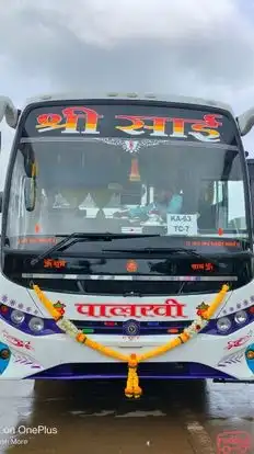 Auodumbar Tours and Travels Bus-Front Image