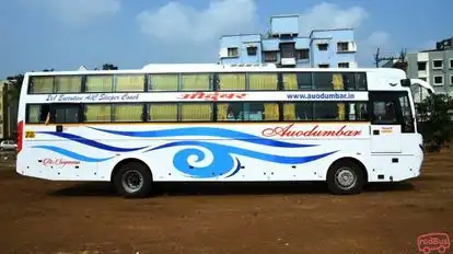 Auodumbar Tours and Travels Bus-Side Image