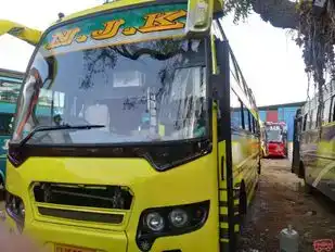 Njk Travels Bus-Side Image