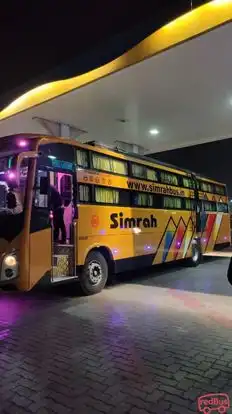 Simra travels agency Bus-Side Image