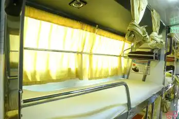 Om Aashuruchi Tours And Travels Bus-Front Image