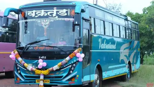 Vakratund travels Bus-Front Image