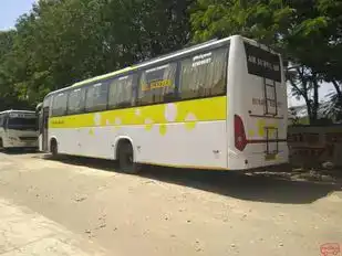 Ashok Travels Gwalior Bus-Side Image