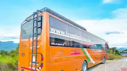 Laxmi holidays Bus-Side Image