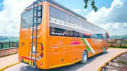 Laxmi holidays Bus-Side Image