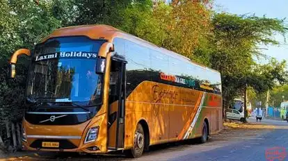 Laxmi holidays Bus-Side Image