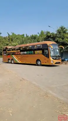 Laxmi holidays Bus-Side Image