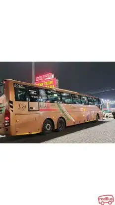 Laxmi holidays Bus-Side Image
