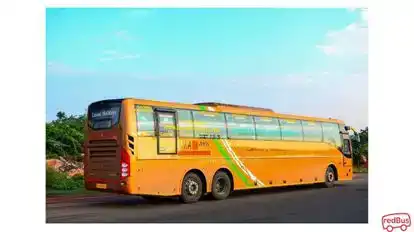 Laxmi holidays Bus-Side Image