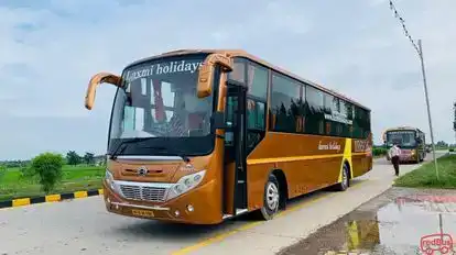 Laxmi Holidays Bus-Side Image