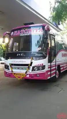 Natchiya travels Bus-Side Image