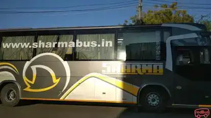 Sharma travel agency Bus-Side Image