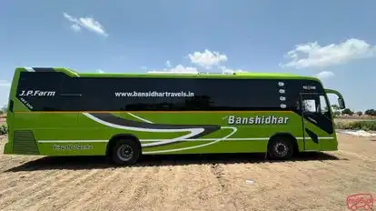 SHREE BANSIDHAR TRAVELS®️ Bus-Side Image