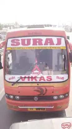 Suraj Travel and Cargo Services Bus-Side Image