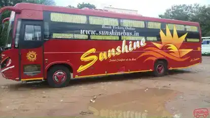Sunshine Travels Bus-Side Image