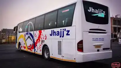Jhajjz Transport Bus-Side Image