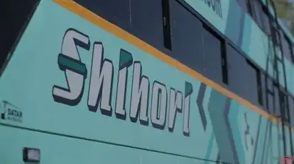 Shihori Tours And Travels ® Bus-Side Image