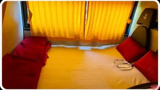 Chouhan travels and Cargo Bus-Front Image