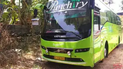 Punchiry Travels and Holidays Bus-Side Image