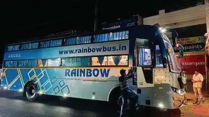 Rainbow Tours And Travels Bus-Side Image