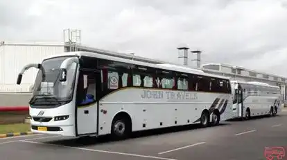 John  Travels Bus-Side Image