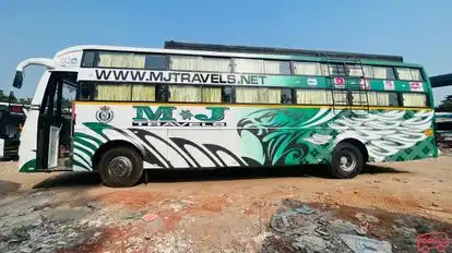 M J Travels Bus-Side Image