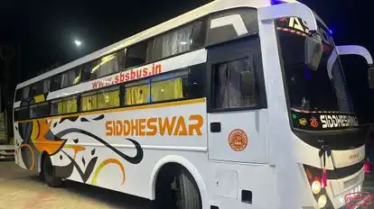 Ashok Travels and Tour Bus-Side Image