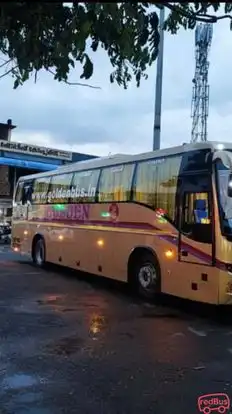 GOLDEN TRAVEL AGENCIES Bus-Side Image