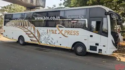 Luxe Xpress Bus-Side Image