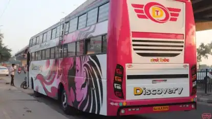 Discovery Travels Bus-Side Image