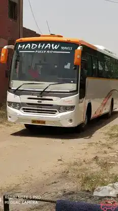 MADHAW TRAVELS Bus-Front Image