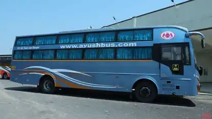 Ayush Tours and Travels Bus-Side Image
